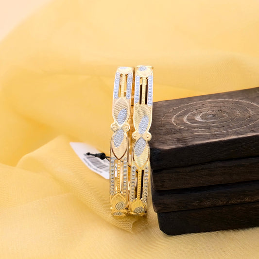 oval design bangles, cnc bangles, dual tone bangles, slim bangles, gold silver bangles, designer bangles