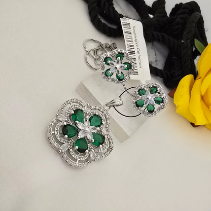 green_floral_jewelry_set_with_clear_stones_on_a_white_surface - Saubhagya Collection 